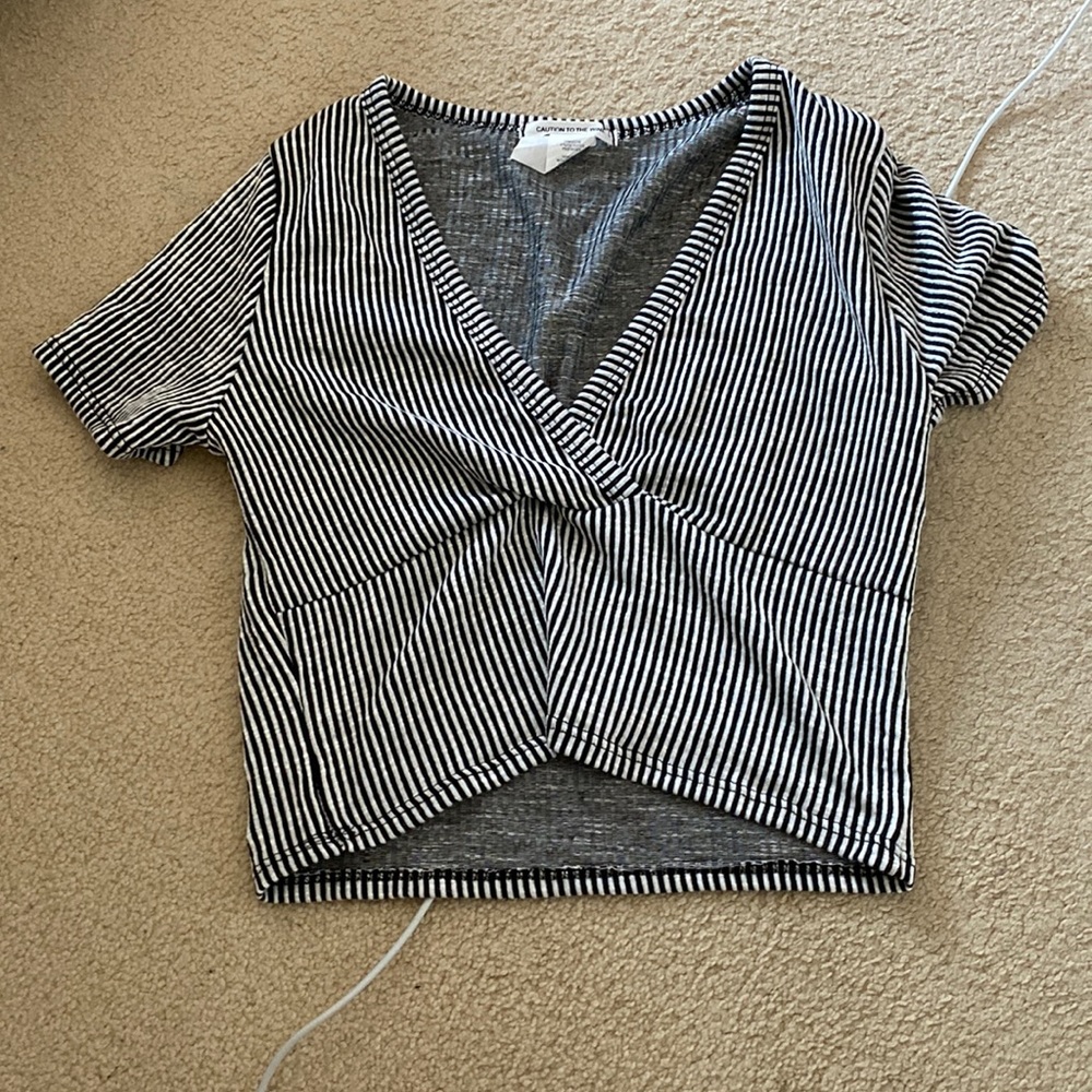 Caution to the wind vneck